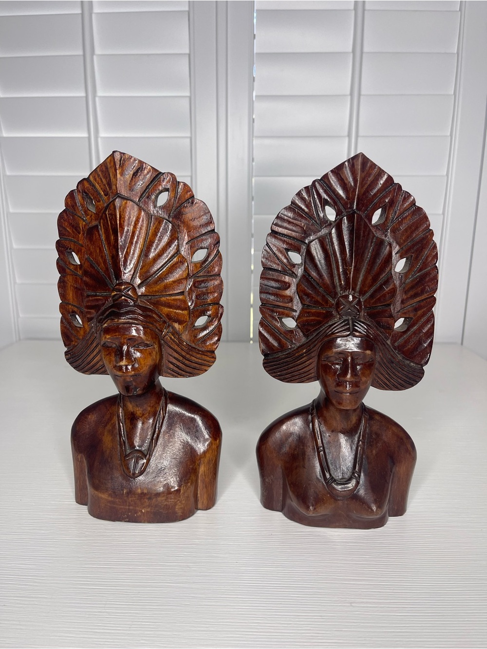 Hand-Carved Brown Wooden Busts with Feather Headdresses - Set of 2